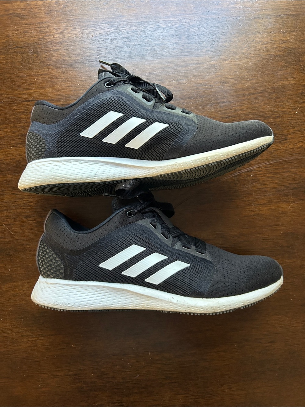 adidas Women’s Black Athletic Shoes with White Stripes